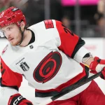 Jun 9, 2026; Las Vegas, Nevada, USA; Carolina Hurricanes defenseman Alexander Nikishin (21) warms up before game four of the 2026 Stanley Cup Final against the Vegas Golden Knights at T-Mobile Arena.