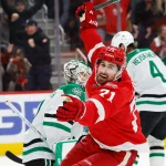 Dec 23, 2025; Detroit, Michigan, USA; Detroit Red Wings center Dylan Larkin (71) celebrates after scoring in overtime against the Dallas Stars at Little Caesars Arena.