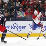 Nov 27, 2024; Columbus, Ohio, USA; Montreal Canadiens right wing Josh Anderson (17) shoots on goal as Columbus Blue Jackets right wing Kirill Marchenko (86) trails the play during the second period at Nationwide Arena.