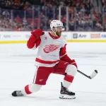 Apr 2, 2026; Philadelphia, Pennsylvania, USA; Detroit Red Wings right wing Alex Debrincat (93) reacts after scoring a goal against the Philadelphia Flyers in the first period at Xfinity Mobile Arena.