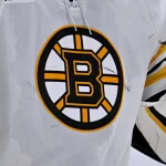 Nov 14, 2024; Dallas, Texas, USA; A view of the Bruins logo on the jersey of Boston Bruins goaltender Jeremy Swayman (1) during the game between the Dallas Stars and the Boston Bruins at the American Airlines Center.