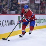 Oct 20, 2025; Montreal, Quebec, CAN; Montreal Canadiens defenseman Arber Xhekaj (72) plays the puck during the second period of the game against the Buffalo Sabres at the Bell Centre.