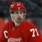 Mar 20, 2021; Detroit, Michigan, USA; Detroit Red Wings center Dylan Larkin (71) looks to his left during the second period against the Dallas Stars at Little Caesars Arena.
