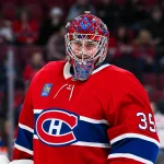 Feb 26, 2026; Montreal, Quebec, CAN; Montreal Canadiens goalie Samuel Montembeault (35) looks on during warm-up before the game against the New York Islanders at Bell Centre.