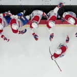 May 21, 2026; Raleigh, North Carolina, USA; Montreal Canadiens center Phillip Danault (24) celebrates with teammates after scoring a goal against the Carolina Hurricanes during the first period in game one of the Eastern Conferene Final of the 2026 Stanley Cup Playoffs at Lenovo Center.