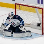March 1, 2026; San Jose, California, USA; Winnipeg Jets goaltender Connor Hellebuyck (37) makes a save against the San Jose Sharks during the third period at SAP Center at San Jose.