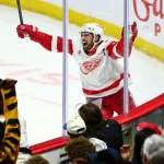 Feb 26, 2026; Ottawa, Ontario, CAN; Detroit Red Wings center Dylan Larkin (71) celebrates after scoring in overtime against the Ottawa Senators at Canadian Tire Centre. :