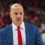 May 10, 2025; Raleigh, North Carolina, USA; Washington Capitals head coach Spencer Carbery walks off the ice after their loss to the Carolina Hurricanes in game three of the second round of the 2025 Stanley Cup Playoffs at Lenovo Center. :