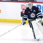 Apr 6, 2026; Winnipeg, Manitoba, CAN; Winnipeg Jets goaltender Connor Hellebuyck (37) warms up before a game against the Seattle Kraken at Canada Life Centre.