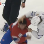 Michael Pezzetta stops when Lucas Condotta loses his helmet