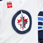 Jan 28, 2025; Montreal, Quebec, CAN; View of a Winnipeg Jets logo on a jersey worn by a member of the team during the second period at Bell Centre. :