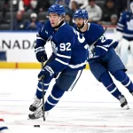 Sep 19, 2026; Toronto, Ontario, CAN; Toronto Maple Leafs forward Gavin McKenna (92) brings the puck up the ice against the Montreal Canadiens in the first period at Scotiabank Arena.