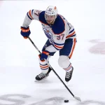 Apr 8, 2026; San Jose, California, USA; Edmonton Oilers center Connor McDavid (97) controls the puck during a game against the San Jose Sharks in the third period at SAP Center at San Jose.