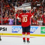 Jun 24, 2024; Sunrise, Florida, USA; Florida Panthers right wing Vladimir Tarasenko (10) kisses the cup after winning game seven of the 2024 Stanley Cup Final against the Edmonton Oilers at Amerant Bank Arena.