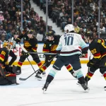Mar 14, 2026; Vancouver, British Columbia, CAN; Vancouver Canucks forward Liam Ohgren (92) and forward Drew O'Connor (18) and defenseman Victor Mancini (90) watch as Seattle Kraken forward Matty Beniers (10) scores on goalie Nikita Tolopilo (60) in the third period at Rogers Arena