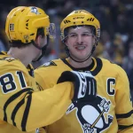 Nov 6, 2025; Pittsburgh, Pennsylvania, USA; Pittsburgh Penguins center Ben Kindel (81) and Pittsburgh Penguins center Sidney Crosby (87) talk before a face-off against the Washington Capitals during the first period at PPG Paints Arena.