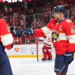 Sep 20, 2026; Sunrise, Florida, USA; Florida Panthers center Aleksander Barkov (16) celebrates his goal with defenseman Niko Mikkola (77) during the second period at Amerant Bank Arena.