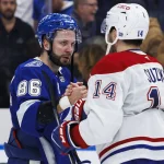 May 3, 2026; Tampa, Florida, USA; Tampa Bay Lightning forward Nikita Kucherov (86) and goalie Andrei Vasilevskiy (88) shake hands with Montreal Canadiens forward Nick Suzuki (14) and forward Josh Anderson (17) after game seven of the first round of the 2026 Stanley Cup Playoffs at Benchmark International Arena.