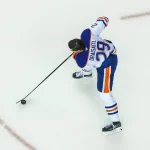 Feb 4, 2026; Calgary, Alberta, CAN; Edmonton Oilers center Leon Draisaitl (29) skates with the puck during the warmup period against the Calgary Flames at Scotiabank Saddledome.