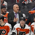 Apr 14, 2026; Philadelphia, Pennsylvania, USA; Philadelphia Flyers head coach Rick Tocchet with this team against the MontrŽal Canadiens during the third period at Xfinity Mobile Arena.