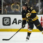 Sep 20, 2026; Boston, Massachusetts, USA; Boston Bruins defenseman Charlie McAvoy (73) skates with the puck during the first period of the game against the Washington Capitals at TD Garden.