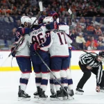 Mar 14, 2026; Philadelphia, Pennsylvania, USA; Columbus Blue Jackets right wing Kirill Marchenko (86) celebrates with teammates after scoring a goal against the Philadelphia Flyers in the first period at Xfinity Mobile Arena.