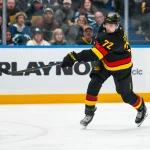 Jan 31, 2026; Vancouver, British Columbia, CAN; Vancouver Canucks forward Filip Chytil (72) shoots against the Toronto Maple Leafs in the second period at Rogers Arena.