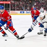 Sep 30, 2023; Montreal, Quebec, CAN; Montreal Canadiens defenseman William Trudeau (84) defends the puck against Toronto Maple Leafs left wing Matthew Knies (23) during the first period at Bell Centre.