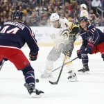 Mar 29, 2026; Columbus, Ohio, USA; Boston Bruins right wing David Pastrnak (88) carries the puck as Columbus Blue Jackets defenseman Erik Gudbranson (44) defnds during the first period at Nationwide Arena.