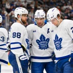 Mar 28, 2026; St. Louis, Missouri, USA; Toronto Maple Leafs right wing William Nylander (88) center John Tavares (91) and left wing Matthew Knies (23) talk before a face off against the St. Louis Blues during the third period at Enterprise Center.