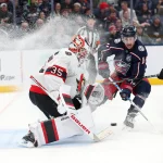 Dec 11, 2025; Columbus, Ohio, USA; Ottawa Senators goaltender Linus Ullmark (35) saves the puck as Columbus Blue Jackets left wing Miles Wood (11) looks for a shot during the second period at Nationwide Arena.