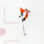 Dec 14, 2025; Raleigh, North Carolina, USA; Philadelphia Flyers center Trevor Zegras (46) skates with the puck against the Carolina Hurricanes during the third period at Lenovo Center.