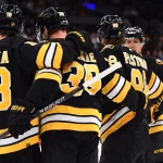 Sep 22, 2026; Boston, Massachusetts, USA; Boston Bruins center Morgan Geekie (39) celebrates his goal with center Pavel Zacha (18) and right wing David Pastrnak (88) during the third period against the Philadelphia Flyers at TD Garden