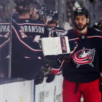 Sep 24, 2026; Columbus, Ohio, USA; Columbus Blue Jackets forward Kirill Marchenko (86) celebrates with teammates on the bench after scoring a goal against the Pittsburgh Penguins in the third period at Nationwide Arena.