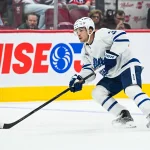 Sep 19, 2026; Montreal, Quebec, CAN; Toronto Maple Leafs defenseman Nick Blankenburg (3) plays the puck against the Montreal Canadiens during the third period at Bell Centre.