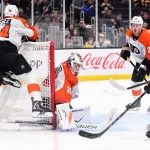 Sep 22, 2026; Boston, Massachusetts, USA; Boston Bruins center Pavel Zacha (18) controls the puck in front of Philadelphia Flyers goaltender Aleksei Kolosov (35) during the third period at TD Garden.