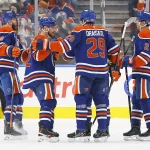 Sep 26, 2026; Edmonton, Alberta, CAN; The Edmonton Oilers celebrate a goal scored by forward Connor McDavid (97) during the second period against the Calgary Flames at Rogers Place.