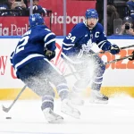 Sep 23, 2026; Toronto, Ontario, CAN; Toronto Maple Leafs forward Auston Matthews (34) watches forward Gavin McKenna (92) control the puck against the Ottawa Senators in the second period at Scotiabank Arena.