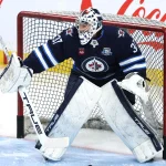 Mar 26, 2026; Winnipeg, Manitoba, CAN; Winnipeg Jets goaltender Connor Hellebuyck (37) warms up before a game against the Colorado Avalanche at Canada Life Centre.