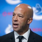 Jun 4, 2026; Vancouver, BC, CANADA; Manny Malhotra speaks during press conference where the Vancouver Canucks introduce Malhotra as their new head coach during a press conference at Rogers Arena.