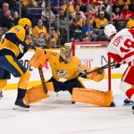 defends during the second period at Bridgestone Arena. Mandatory Credit: Steve Roberts-Imagn ImagesMar 2, 2026; Nashville, Tennessee, USA; Nashville Predators goaltender Juuse Saros (74) blocks the shot of Detroit Red Wings center Andrew Copp (18) during the first period at Bridgestone Arena.