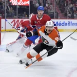 23 septembre 2025; Montréal, Québec, Canada; L'attaquant des Flyers de Philadelphie, Anthony Richard (90), marque un but contre le gardien des Canadiens de Montréal, Kaapo Kahkonen (34), en deuxième période au Centre Bell.