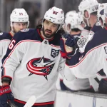 Feb 26, 2026; Boston, Massachusetts, USA; Columbus Blue Jackets right wing Kirill Marchenko (86) celebrates a goal against the Boston Bruins with his teammates during the first period at TD Garden.