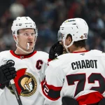 Mar 9, 2026; Vancouver, British Columbia, CAN; Ottawa Senators defenseman Thomas Chabot (72) talks with forward Brady Tkachuk (7) against the Vancouver Canucks in the third period at Rogers Arena.