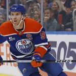 Sep 26, 2026; Edmonton, Alberta, CAN; Edmonton Oilers forward Connor McDavid (97) follows the play against the Calgary Flames at Rogers Place.