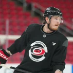 Jun 1, 2026; Raleigh, North Carolina, USA; Carolina Hurricanes defenseman Alexander Nikishin (21) skates during the practice during media day for the 2026 Stanley Cup Final at Lenovo Center.