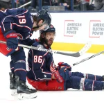 Jan 25, 2025; Columbus, Ohio, USA; Columbus Blue Jackets right wing Kirill Marchenko (86) celebrates his game winning goal in overtime with center Adam Fantilli (19) against the Los Angeles Kings at Nationwide Arena.