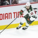 Apr 4, 2026; Ottawa, Ontario, CAN; Minnesota Wild defenseman Quinn Hughes (43) skates with the puck in the third period against the Ottawa Senators at the Canadian Tire Centre.
