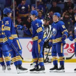 Sep 26, 2026; Buffalo, New York, USA; Buffalo Sabres center Ryan McLeod (71) celebrates his goal with teammates during the third period against the Pittsburgh Penguins at KeyBank Center.