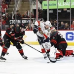 Stanley Cup champion wants to play for the Canadiens, but a problem arises May 28, 2025; Raleigh, North Carolina, USA; Florida Panthers forward Brad Marchand (63) controls the puckdefended by Carolina Hurricanes defenseman Alexander Nikishin (21) and goaltender Frederik Andersen (31) during the first period in game five of the Eastern Conference Final of the 2025 Stanley Cup Playoffs at Lenovo Center. Mandatory Credit: Geoff Burke-Imagn Images